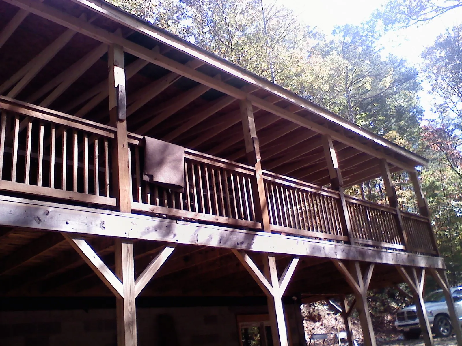 Timber framing under a new elevated porch and deck — Roof Leak Repair in Scales Mound by Roofing Brothers